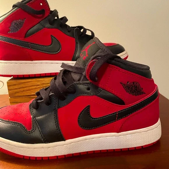 Air Jordans Mid Size. Worn a couple times. All black air Jordan 1. Lightly used worn a couple times  main image 2